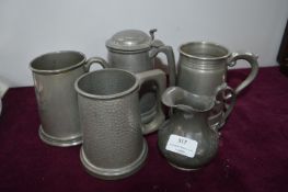 Four Pewter Tankards and a Jug