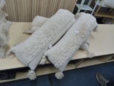 *Three Sausage Cushions with Tassels