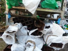 *Stillage of Brown Plastic Guttering and Downpipe