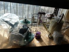 *Bird Feeders and a Watering Can