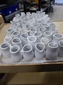 * small white milk jugs x approx. 50