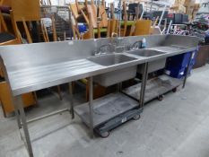 * Very large double sink with 2 sets of taps, additional spray hose tap, drainer to each side,