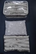 Three Silver Cushions with Decorative Buttons, and