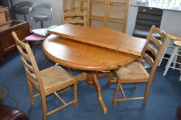 Circular Pine Dining Table with Three Rush Seated