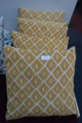 Four Gold Cushions