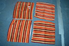 Four Stripped Cushion Covers