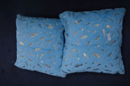 Pair of Pale Blue Cushions with Golden Feather Des