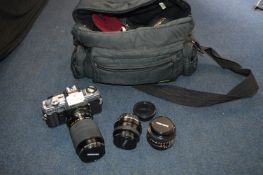 Minolta X-300 35mm Camera plus Case and Lenses