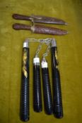Two Pairs of Nunchucks and a Pair of Kukris