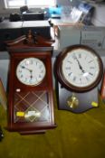 Two Quartz Wall Clocks