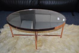 Mirror Topped Oval Copper Effect Coffee Table