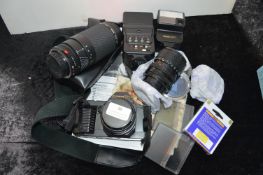 Canon T70 35mm Camera with Lenses, Flash, Filters,