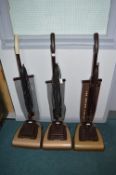 Three Hoover Vacuum Cleaners