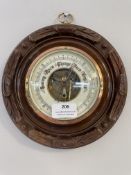 Barometer in Carved Mahogany Frame