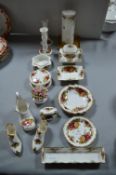 Fifteen Pieces of Royal Albert Country Roses; Dishes, Candlesticks, etc.