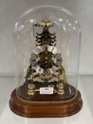 Comitti of London Skeleton Clock with Glass Dome and Mahogany Base