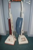 Two Hoover Vacuum Cleaners