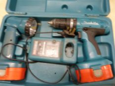 *Makita Drill with Battery and Charger, and a Maki