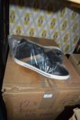 Twelve Pairs of Size: 45 Black Trainers