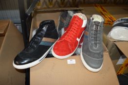 Twelve Pairs of Assorted African Leather Trainers