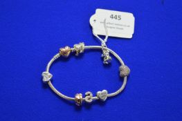 Pandora Bracelet with Five Charms and Two Clips