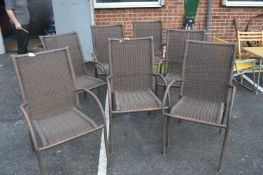 Seven Stacking Garden Chairs
