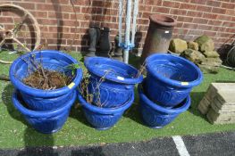 Six Blue Painted Plastic Planters