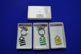 Three Lacoste Enameled Football Shirt Key Fobs