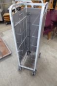 * tray rack on castors with enclosed sides