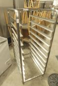 * S/S tray trolly on castors. 550w x 800d x 1430h