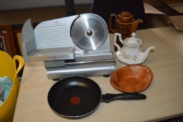 Pan and a Meat Slicer