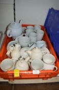 *White Pottery Mugs, Teapots, etc.