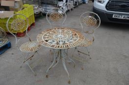 *Cast Iron Garden Table with Three Chairs