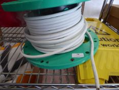 * roll of white cable