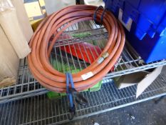 * large coil of propane pipe