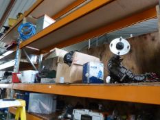 *Contents of Shelf; Chainsaw and Lawnmower Parts,