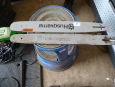 *Two Husqvarna Chainsaw Bars