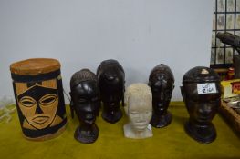 Five Ethnic Carved Heads and a Drum