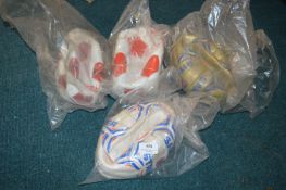 Four Assorted Footballs