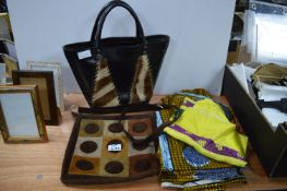 Two Leather Handbags and Ethnic Fabrics