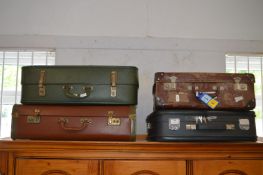 Four Vintage Suitcases