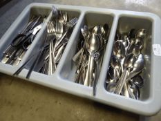 * grey tray with cutlery