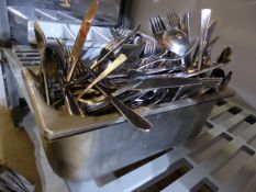 * gastro filled with large quantity of cutlery