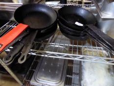 * 10 x small cast frying pans - 18cm