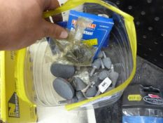 *Bucket of Various Grinding Wheels and Stones