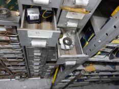 *Eight Drawers of Various Bearings and Parts