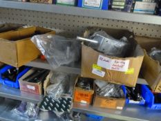 *Shelf of Various Spring-Loaded Latches and Levers