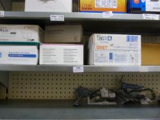 *Shelf of Various Face Masks, Earplugs, Labels, etc.