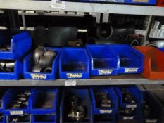 *Shelf of Various Stainless Steel Threaded Pipe Elbows