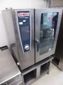 * Rationale combi oven self cooking centre. SCCWE101. on stand with racks